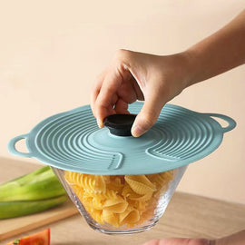 Återanvändbart självtätande lock