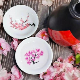 Magiska blommor som blommar te sakekopp, keramisk mugg som ändrar is/het färg